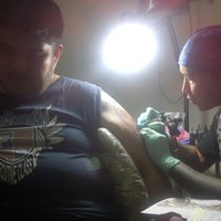 Photo taken at Skin Media Tattoo and Piercing by Chelsea C. on 12/20/2012
