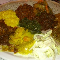 Photo taken at Harambe Ethiopian Cuisine by Sophia Y. on 12/4/2012
