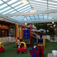 Photo taken at Childrens Play Area - University Village by Kerry M. on 7/13/2013