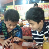 Photo taken at Potre Koneng Seafood by Rifki F. on 4/23/2013