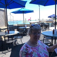 Photo taken at T.K.O. Malley&amp;#39;s Sports Cafe and Marina by Michael J. on 7/20/2018