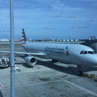 Photo taken at Gate 38 by Andre H. on 9/26/2015