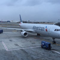 Photo taken at Gate 46 by Andre H. on 12/11/2014