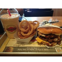 Photo taken at Fatburger by Juan D. on 7/26/2013