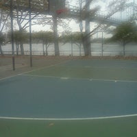 Photo taken at Astoria Park Basketball Courts by Juan S. on 10/7/2013