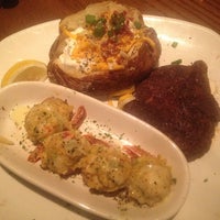 Photo taken at Outback Steakhouse by Marti P. on 7/20/2014