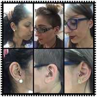 Photo taken at Simple Tattoo Piercing by Leandro R. on 12/6/2016