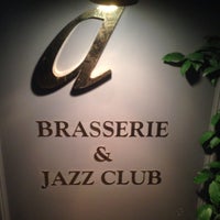 Photo taken at Divine Brasserie &amp;amp; Jazz Club by Gorkem E. on 3/6/2015