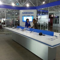 Photo taken at Samsung Brand Zone in Terminal F by Владимир К. on 1/31/2013