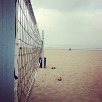 Photo taken at Venice Beach Volleyball Courts by Erik W. on 3/18/2013