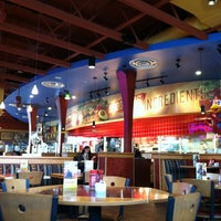 Photo taken at Red Robin Gourmet Burgers and Brews by Curtis F. on 10/9/2012
