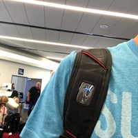 Photo taken at Gate 76 by Erik W. on 7/25/2018