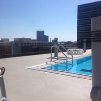 Photo taken at MidCity Lofts Rooftop Pool by Christy B. on 5/6/2014