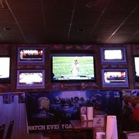 Photo taken at Chicken Coop Sports Bar &amp;amp; Grill by Ross H. on 1/13/2013
