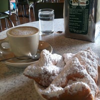 Photo taken at Café du Monde by Allan D. on 4/16/2013