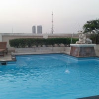 Photo taken at Rikka Inn Rooftop Swimming Pool by Jana E. on 12/26/2012