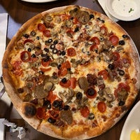 Photo taken at Amici&amp;#39;s East Coast Pizzeria by Kenneth I. on 12/1/2023