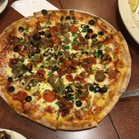 Photo taken at Amici&amp;#39;s East Coast Pizzeria by Kenneth I. on 5/21/2019