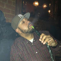 Photo taken at Zamaan Hookah Bar and Lounge by Kevin L. on 3/11/2013