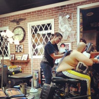 Photo taken at Wyld Chyld Tattoo by Christopher C. on 12/2/2012
