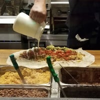 Photo taken at Iguanas Taqueria by DewClaw S. on 3/30/2018