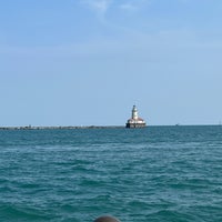 Photo taken at Chicago Harbor Southeast Guidewall Lighthouse by Andrew T. on 9/16/2022