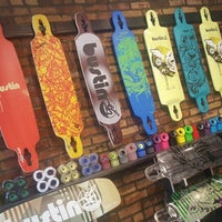 Photo taken at Bustin Boards Skateboard Shop by Maggie on 5/5/2016