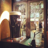 Photo taken at GUINNESS -THE PUB- 丸の内 (PAGLIACCIO 丸の内仲通り店) by Hiroshi M. on 10/23/2012