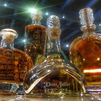 Photo taken at Bacchus Liquors by Juan Carlos D. on 2/25/2015