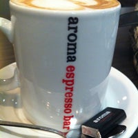 Photo taken at Aroma Espresso Bar by Maegan T. on 11/9/2012