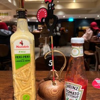 Photo taken at Nando&amp;#39;s by Zoltan D. on 4/16/2022