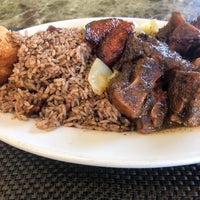 Photo taken at Ackee Bamboo Jamaican Cuisine by April on 3/29/2019