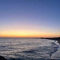 Photo taken at Lido Marini Beach by Azer C. on 10/2/2023
