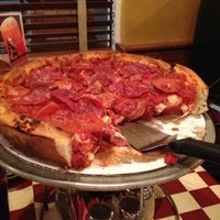Photo taken at Giordano&amp;#39;s by Kenny H. on 12/18/2012