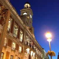 Photo taken at Puerta del Sol by Carmen A. on 4/11/2013