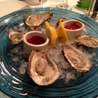 Photo taken at The Grilled Oyster Company by Robert C. on 5/18/2013
