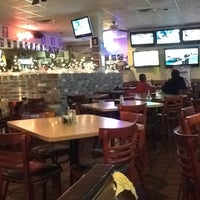 Photo taken at Mudville Grille by William M. on 12/14/2012