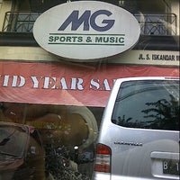 Photo taken at MG Sports &amp;amp; Music by ApRita D. on 7/20/2013