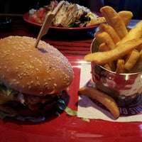 Photo taken at Red Robin Gourmet Burgers and Brews by Angela W. on 8/5/2013