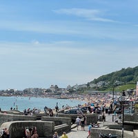 Photo taken at Lyme Regis Beach by Sharon D. on 8/3/2021