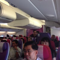 Photo taken at Thai Airways Flight TG 409 BKK-SIN by Ian B. on 12/5/2012