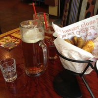 Photo taken at Red Robin Gourmet Burgers and Brews by Justin B. on 4/30/2013