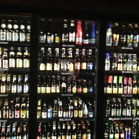 Photo taken at World of Beer by Jennifer J. on 12/24/2012