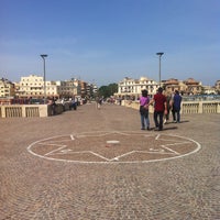 Photo taken at Pontile di Ostia by Rita N. on 5/4/2013