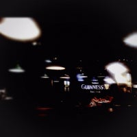 Photo taken at GUINNESS -THE PUB- 丸の内 (PAGLIACCIO 丸の内仲通り店) by Satoko O. on 10/23/2012