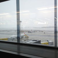 Photo taken at Gate G09 by Alexey M. on 3/14/2013