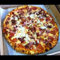 Photo taken at Solorzano Bros. Pizza by Carlos S. on 10/12/2012