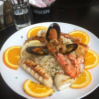 Photo taken at Dish Restaurant by Jovana I. on 10/7/2012