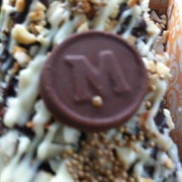 Photo taken at Magnum Store by Eliza Y. on 10/28/2012