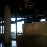 Photo taken at Gate D62 by Alexander M. on 10/15/2012